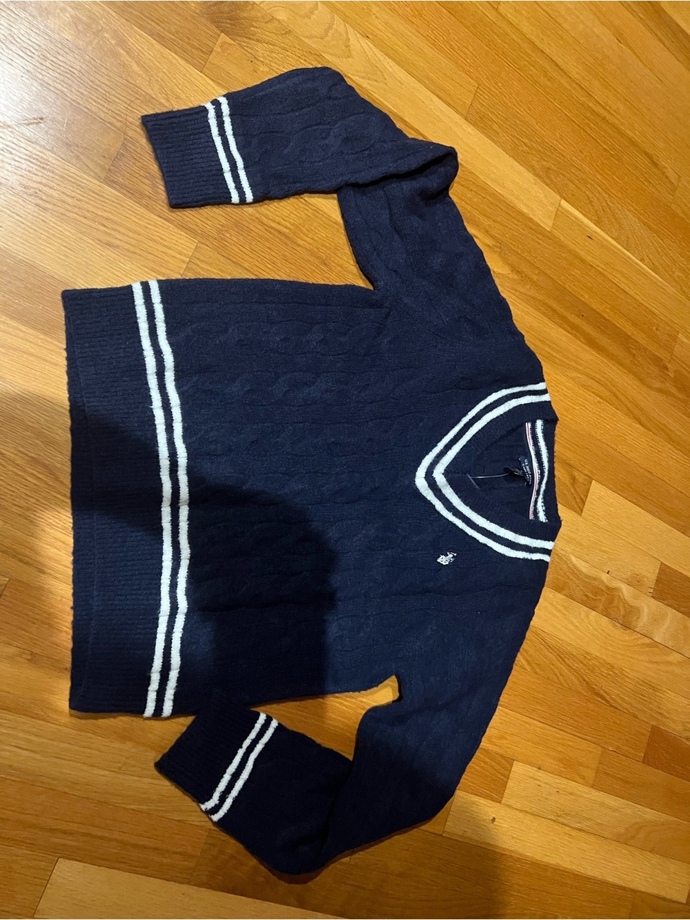 U.S. Polo Assn. women’s Navy V-Neck Cable Knit Sweater with White Stripe Trim
